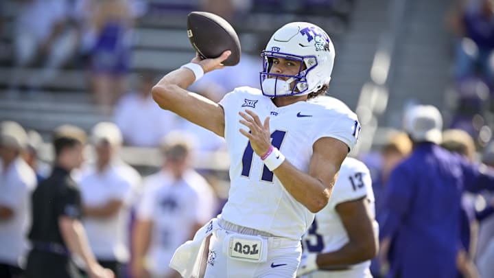 Sep 20, 2025; Fort Worth, Texas, USA;  TCU Horned Frogs quarterback Adam Schobel (11) warms up before the game against the SMU Mustangs at Amon G. Carter Stadium. Mandatory Credit: Jerome Miron-Imagn Images