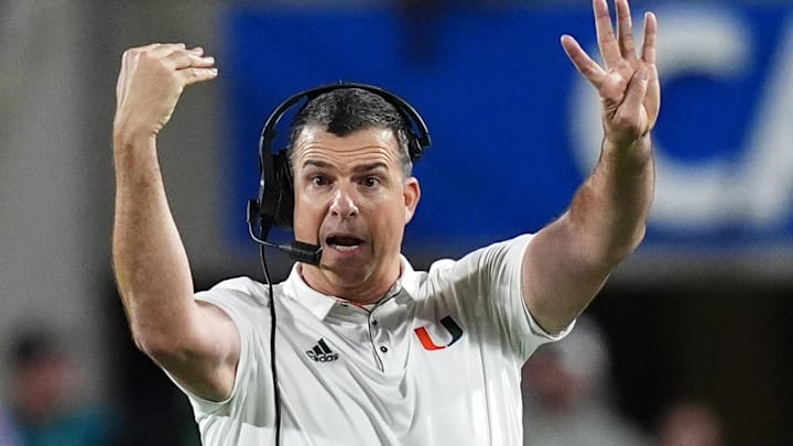 Dec 28, 2024; Orlando, FL, USA; Miami Hurricanes head coach Mario Cristobal reacts during the second half against the Iowa State Cyclones at Camping World Stadium. Mandatory Credit: Jasen Vinlove-Imagn Images Dec 28, 2024; Orlando, FL, USA; Miami Hurricanes head coach Mario Cristobal reacts during the second half against the Iowa State Cyclones at Camping World Stadium. Mandatory Credit: Jasen Vinlove-Imagn Images