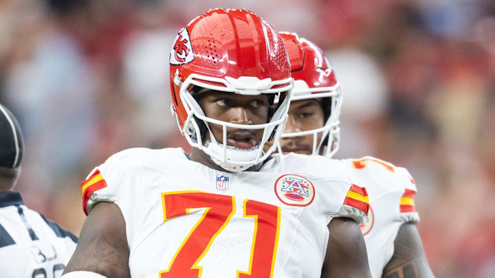 Aug 9, 2025; Glendale, Arizona, USA; Kansas City Chiefs offensive tackle Josh Simmons (71) against the Arizona Cardinals during a preseason NFL game at State Farm Stadium. Mandatory Credit: Mark J. Rebilas-Imagn Images