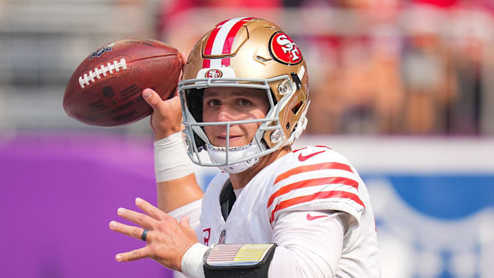 Sep 15, 2024; Minneapolis, Minnesota, USA; San Francisco 49ers quarterback Brock Purdy (13) passes against the Minnesota Vikings in the first quarter at U.S. Bank Stadium. Mandatory Credit: Brad Rempel-Imagn Images Sep 15, 2024; Minneapolis, Minnesota, USA; San Francisco 49ers quarterback Brock Purdy (13) passes against the Minnesota Vikings in the first quarter at U.S. Bank Stadium. Mandatory Credit: Brad Rempel-Imagn Images