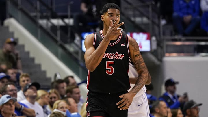 Feb 7, 2026; Provo, Utah, USA; Houston Cougars forward Chris Cenac Jr. (5) reacts to a made three-point shot during the first half against the BYU Cougars at Marriott Center. Mandatory Credit: Aaron Baker-Imagn Images