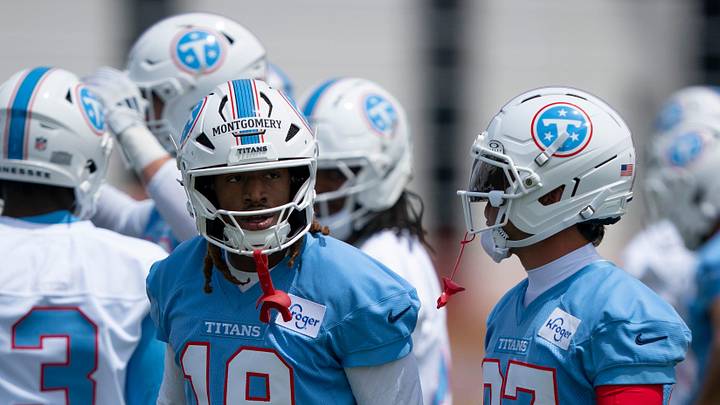 Tennessee Titans wide receivers Tyren Montgomery (19) and Xavier Restrepo (87) talk between drills during the Titans Rookie Camp Day 1 at Vanderbilt Health Football Center in Nashville, Tenn., Friday, May 1, 2026.