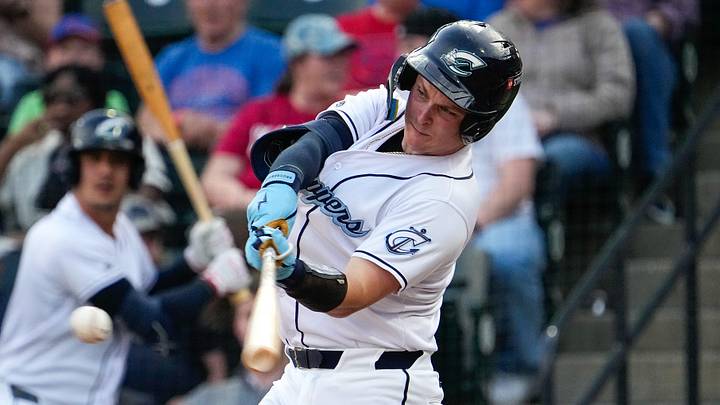 Columbus Clippers Cooper Ingle (2) hits the ball during the home opener against the Indianapolis Indians at Huntington Park on Tuesday, March 31, 2026, in Columbus, Ohio.