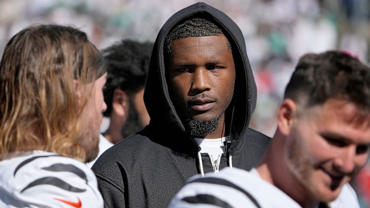 Cincinnati Bengals wide receiver Tee Higgins (5) talks with his teammates as the Bengals face the Philadelphia Eagles during the NFL Week 8 matchup at Paycor Stadium Sunday October 27, 2024. Higgins missed the game due to an injury.