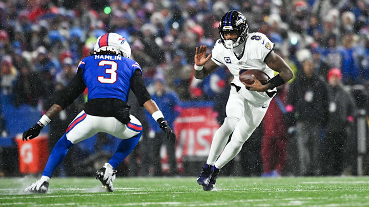 Jan 19, 2025; Orchard Park, New York, USA; Baltimore Ravens quarterback Lamar Jackson (8) runs the ball against Buffalo Bills safety Damar Hamlin (3) during the second quarter in a 2025 AFC divisional round game at Highmark Stadium. Mandatory Credit: Mark Konezny-Imagn Images Jan 19, 2025; Orchard Park, New York, USA; Baltimore Ravens quarterback Lamar Jackson (8) runs the ball against Buffalo Bills safety Damar Hamlin (3) during the second quarter in a 2025 AFC divisional round game at Highmark Stadium. Mandatory Credit: Mark Konezny-Imagn Images