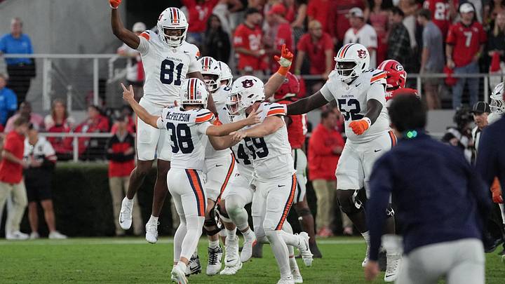 Oct 17, 2026; Athens, Georgia, USA; Auburn kicker Alex McPherson (38) celebrates with teammates following a game-winning field goal during the fourth quarter against Georgia at Sanford Stadium. Mandatory Credit: Dale Zanine-Imagn Images Oct 17, 2026; Athens, Georgia, USA; Auburn kicker Alex McPherson (38) celebrates with teammates following a game-winning field goal during the fourth quarter against Georgia at Sanford Stadium. Mandatory Credit: Dale Zanine-Imagn Images