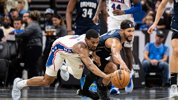 Dec 27, 2023; Orlando, Florida, USA; Philadelphia 76ers small guard De'Anthony Melton (8) and