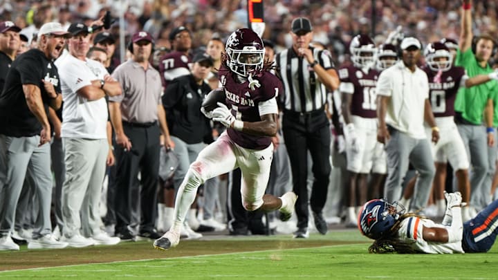Aug 30, 2025; College Station, Texas, USA; Texas A&M Aggies wide receiver Mario Craver (1) running with the football in the second half against the UTSA Roadrunners at Kyle Field. Mandatory Credit: Sean Thomas-Imagn Images