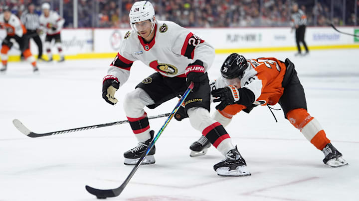 Nov 8, 2025; Philadelphia, Pennsylvania, USA; Ottawa Senators center Dylan Cozens (24) controls the puck against Philadelphia Flyers right wing Matvei Michkov (39) in the third period at Xfinity Mobile Arena. Mandatory Credit: Kyle Ross-Imagn Images Nov 8, 2025; Philadelphia, Pennsylvania, USA; Ottawa Senators center Dylan Cozens (24) controls the puck against Philadelphia Flyers right wing Matvei Michkov (39) in the third period at Xfinity Mobile Arena. Mandatory Credit: Kyle Ross-Imagn Images