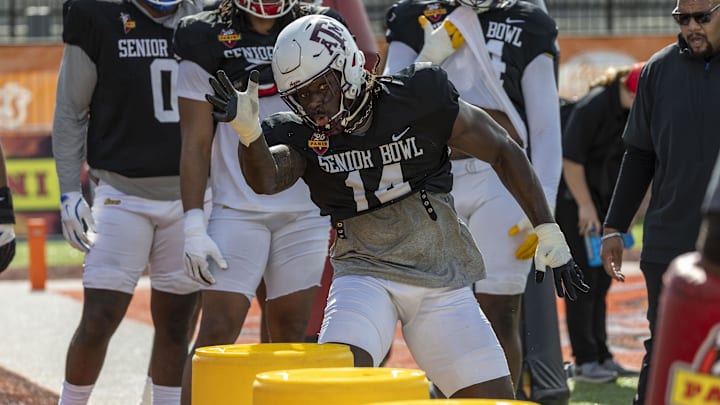Jan 29, 2025; Mobile, AL, USA;  American team defensive lineman Shemar Stewart of Texas A&M (14) works through drills during Senior Bowl practice at Hancock Whitney Stadium. Mandatory Credit: Vasha Hunt-Imagn Images