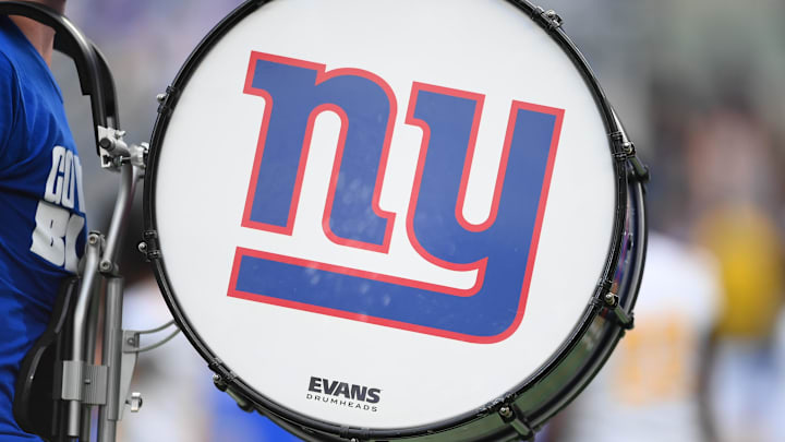 Detailed view of a New York Giants logo on a bass drum Detailed view of a New York Giants logo on a bass drum