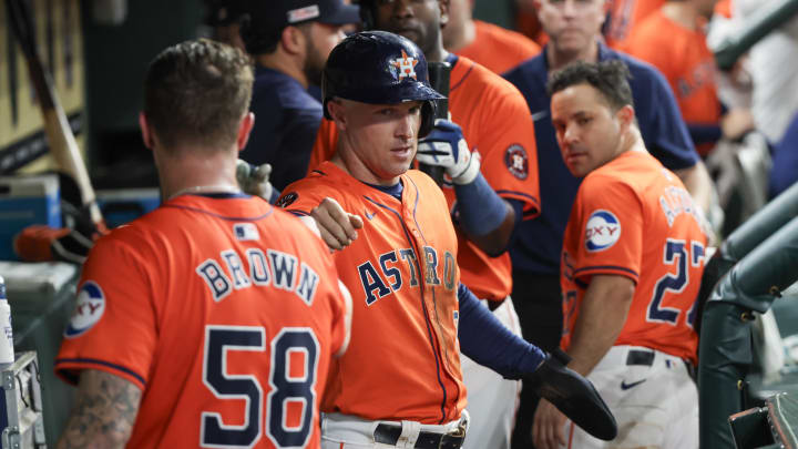 Jun 14, 2024; Houston, Texas, USA;  Houston Astros starting pitcher Hunter Brown (58) celebrates third baseman Alex Bregman (2) run against the Detroit Tigers in the sixth inning at Minute Maid Park.