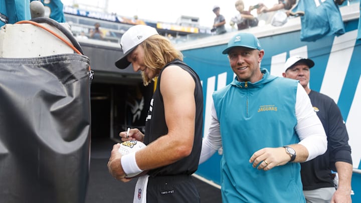 Aug 9, 2025; Jacksonville, Florida, USA;  Jacksonville Jaguars quarterback Trevor Lawrence (16) and head coach Liam Coen before the game against the Pittsburgh Steelers at EverBank Stadium. Mandatory Credit: Morgan Tencza-Imagn Images