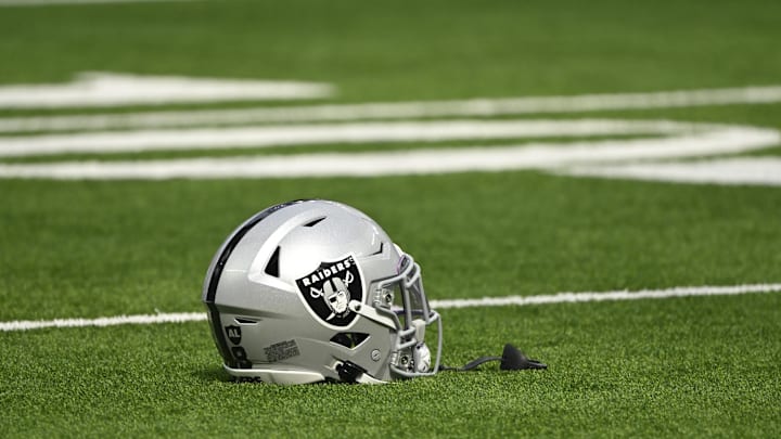 Oct 20, 2024; Inglewood, California, USA; Las Vegas Raiders helmet on the turn at SoFi Stadium during pregame warmups before an NFL game against the Los Angeles Rams. Mandatory Credit: Robert Hanashiro-Imagn Images