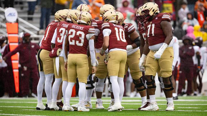 Sep 26, 2026; Chestnut Hill, Massachusetts, USA; Boston College Eagles offense huddle in the first half against the Virginia Tech Hokies at Alumni Stadium. Mandatory Credit: Edward Finan-Imagn Images Sep 26, 2026; Chestnut Hill, Massachusetts, USA; Boston College Eagles offense huddle in the first half against the Virginia Tech Hokies at Alumni Stadium. Mandatory Credit: Edward Finan-Imagn Images