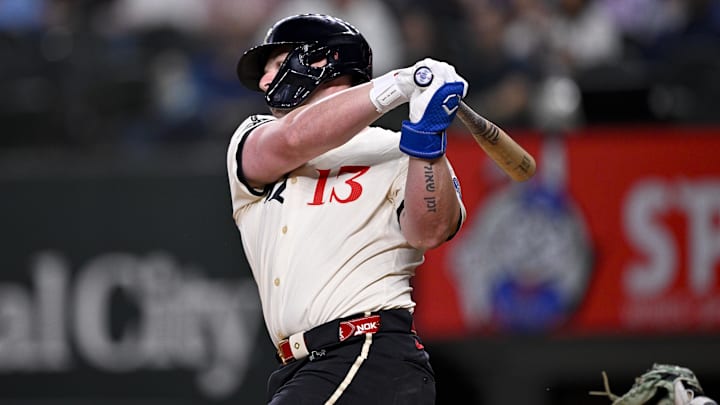 May 2, 2025; Arlington, Texas, USA; Texas Rangers first baseman Blaine Crim (13) strikes out in his first major league at bat during the third inning against the Seattle Mariners at Globe Life Field. 
