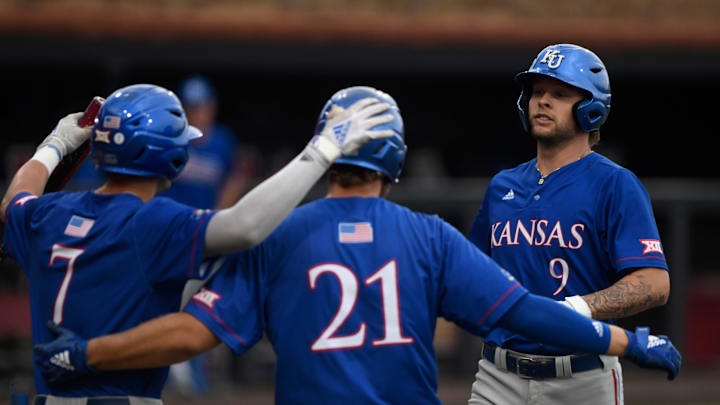 Kansas' right fielder Luke Leto (9) runs to home plate after hitting a home run against Texas Tech