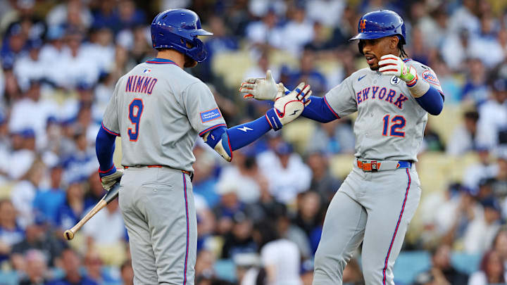 Jun 2, 2025; Los Angeles, California, USA; New York Mets shortstop Francisco Lindor (12) celebrates with New York Mets outfielder Brandon Nimmo (9) during the first inning against the Los Angeles Dodgers during the first inning against the New York Mets at Dodger Stadium. Mandatory Credit: Jason Parkhurst-Imagn Images Jun 2, 2025; Los Angeles, California, USA; New York Mets shortstop Francisco Lindor (12) celebrates with New York Mets outfielder Brandon Nimmo (9) during the first inning against the Los Angeles Dodgers during the first inning against the New York Mets at Dodger Stadium. Mandatory Credit: Jason Parkhurst-Imagn Images