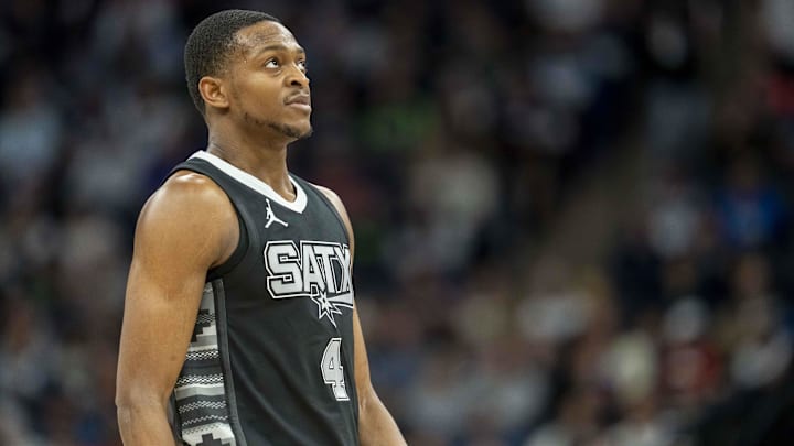 Mar 9, 2025; Minneapolis, Minnesota, USA; San Antonio Spurs guard De'Aaron Fox (4) looks on against the Minnesota Timberwolves in the second half at Target Center.