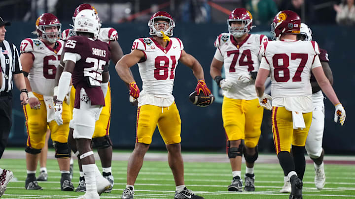 Dec 27, 2024; Las Vegas, NV, USA; Southern California Trojans wide receiver Kyle Ford (81) celebrates after a first down against the Texas A&M Aggies in the second half at Allegiant Stadium. Mandatory Credit: Kirby Lee-Imagn Images