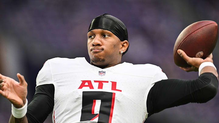 Dec 8, 2024; Minneapolis, Minnesota, USA; Atlanta Falcons quarterback Michael Penix Jr. (9) warms up before the game against the Minnesota Vikings at U.S. Bank Stadium. Mandatory Credit: Jeffrey Becker-Imagn Images