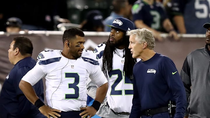 Richard Sherman, Russell Wilson and Pete Carroll with the Seattle Seahawks Richard Sherman, Russell Wilson and Pete Carroll with the Seattle Seahawks