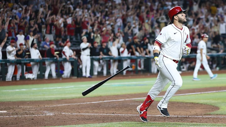 Arizona Diamondbacks third base Eugenio Suarez (28) drops his bat after hitting a walk-off single on Sept. 15, 2024 at Chase Field in Phoenix. Arizona Diamondbacks third base Eugenio Suarez (28) drops his bat after hitting a walk-off single on Sept. 15, 2024 at Chase Field in Phoenix.