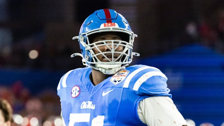 Jan 8, 2026; Glendale, AZ, USA; Mississippi Rebels defensive tackle Zxavian Harris (51) against the Miami Hurricanes during the 2026 Fiesta Bowl and semifinal game of the College Football Playoff at State Farm Stadium. Mandatory Credit: Mark J. Rebilas-Imagn Images