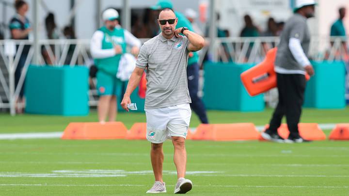 Miami Dolphins general manager Jon-Eric Sullivan walks on the field during practice at the Baptist Health Training Complex. Miami Dolphins general manager Jon-Eric Sullivan walks on the field during practice at the Baptist Health Training Complex.