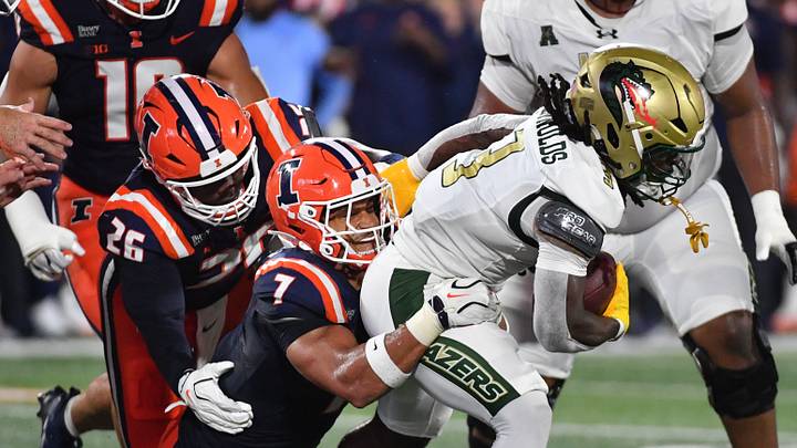 Sep 3, 2026; Champaign, Illinois, USA; Illinois Fighting Illini defensive back Matthew Bailey (7) tackles UAB Blazers running back Bam McReynolds (3) during the first half at Gies Memorial Stadium. Mandatory Credit: Ron Johnson-Imagn Images Sep 3, 2026; Champaign, Illinois, USA; Illinois Fighting Illini defensive back Matthew Bailey (7) tackles UAB Blazers running back Bam McReynolds (3) during the first half at Gies Memorial Stadium. Mandatory Credit: Ron Johnson-Imagn Images