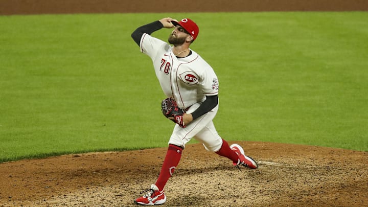 May 21, 2021; Cincinnati, Ohio, USA; Cincinnati Reds relief pitcher Tejay Antone (70) throws a pitch against the Milwaukee Brewers during the seventh inning at Great American Ball Park. Mandatory Credit: Katie Stratman-Imagn Images