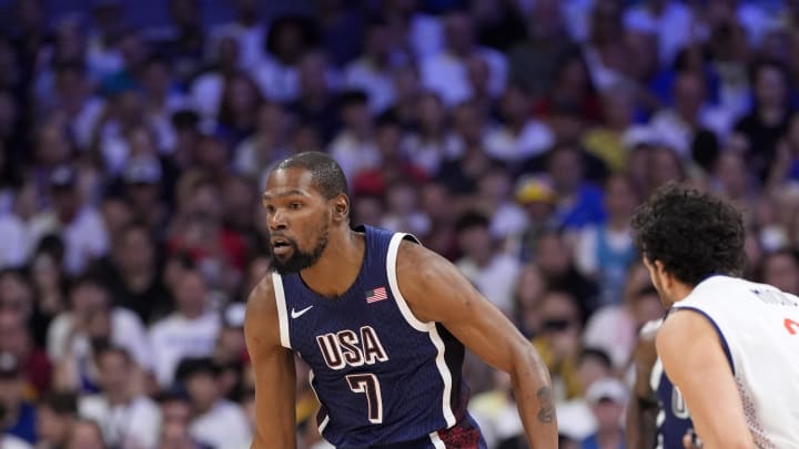Jul 28, 2024; Villeneuve-d'Ascq, France; United States guard Kevin Durant (7) dribbles in the first quarter against Serbia during the Paris 2024 Olympic Summer Games at Stade Pierre-Mauroy. Mandatory Credit: John David Mercer-USA TODAY Sports