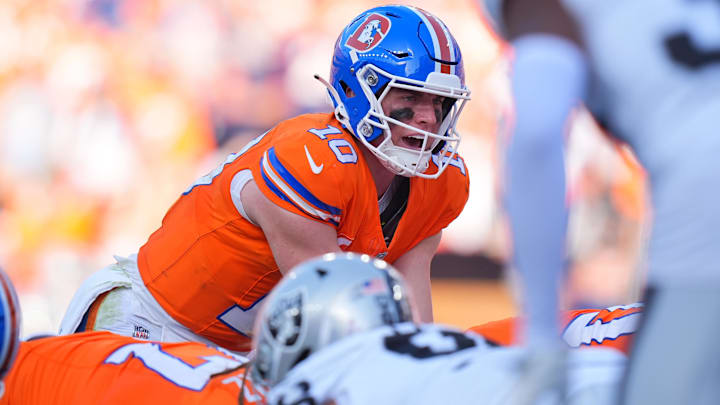 Oct 6, 2024; Denver, Colorado, USA; Denver Broncos quarterback Bo Nix (10) during the fourth quarter against the Las Vegas Raiders at Empower Field at Mile High. 