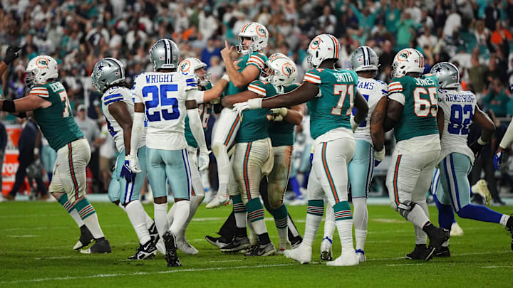 Miami Dolphins place kicker Jason Sanders (7) celebrates with teammates after kicking the game winning field goal against the Dallas Cowboys at Hard Rock Stadium in 2023.