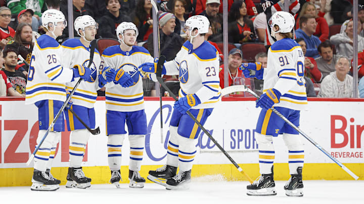 Apr 13, 2026; Chicago, Illinois, USA; Buffalo Sabres center Josh Norris (9) celebrates with teammates after scoring against the Chicago Blackhawks during the first period at United Center. Mandatory Credit: Kamil Krzaczynski-Imagn Images