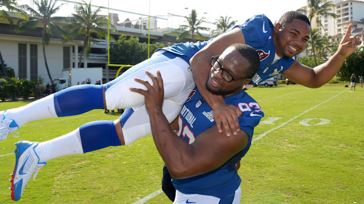Jan 25, 2013, Ko Olina, HI, USA; Tampa Bay Buccaneers defensive tackle Gerald McCoy (93) carries Buccaneers running back Doug Martin on his back at NFC media day for the 2013 Pro Bowl at the JW Marriott Ihilani Resort. Mandatory Credit: Kirby Lee-Imagn Images Jan 25, 2013, Ko Olina, HI, USA; Tampa Bay Buccaneers defensive tackle Gerald McCoy (93) carries Buccaneers running back Doug Martin on his back at NFC media day for the 2013 Pro Bowl at the JW Marriott Ihilani Resort. Mandatory Credit: Kirby Lee-Imagn Images