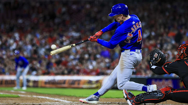 May 23, 2025; Cincinnati, Ohio, USA; Chicago Cubs outfielder Pete Crow-Armstrong (4) hits a grand slam in the seventh inning against the Cincinnati Reds at Great American Ball Park.