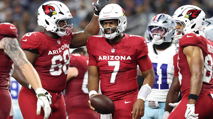Nov 3, 2025; Arlington, Texas, USA; Arizona Cardinals quarterback Jacoby Brissett (7) celebrates with offensive tackle Kelvin Beachum (68) after scoring a touchdown against the Dallas Cowboys in the first half at AT&T Stadium.