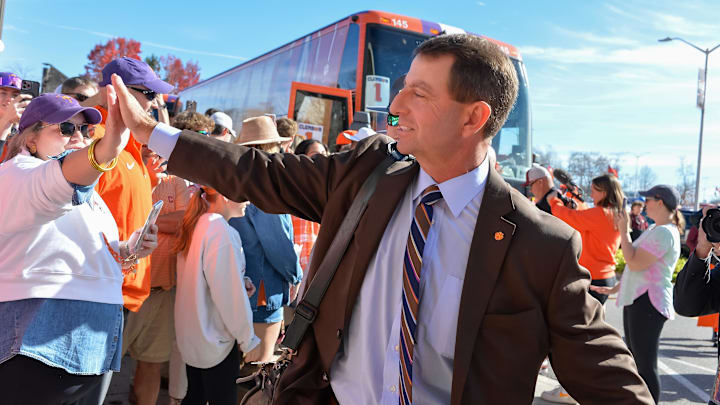 Nov 9, 2024; Blacksburg, Virginia, USA; Clemson Tigers head coach Dabo Swinney greets fans before the game against the Virginia Tech Hokies at Lane Stadium. 