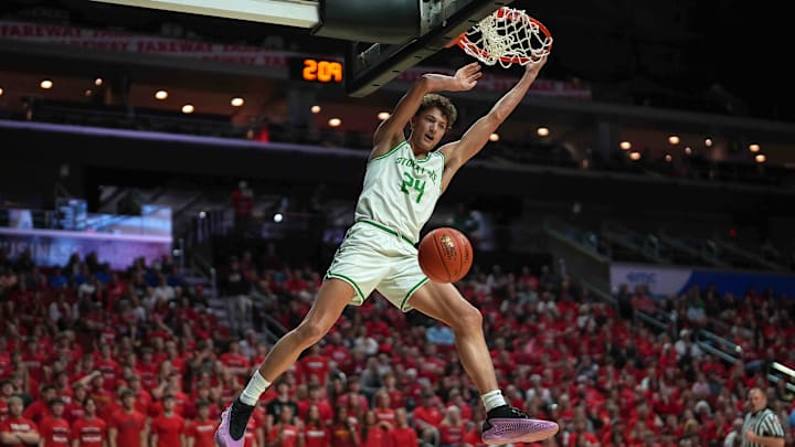 Storm Lake junior Jaidyn Coon dunks the basketball against ADM during the Iowa high school boys state basketball tournament on Monday, March 10, 2025, at Wells Fargo Arena in Des Moines. Mandatory Credit: Bryon Houlgrave-The Des Moines Register