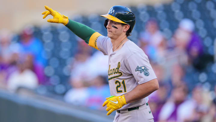 Jun 13, 2024; Minneapolis, Minnesota, USA; Oakland Athletics first base Tyler Soderstrom (21) celebrates his home run against the Minnesota Twins in the second inning at Target Field. Mandatory Credit: Brad Rempel-USA TODAY Sports