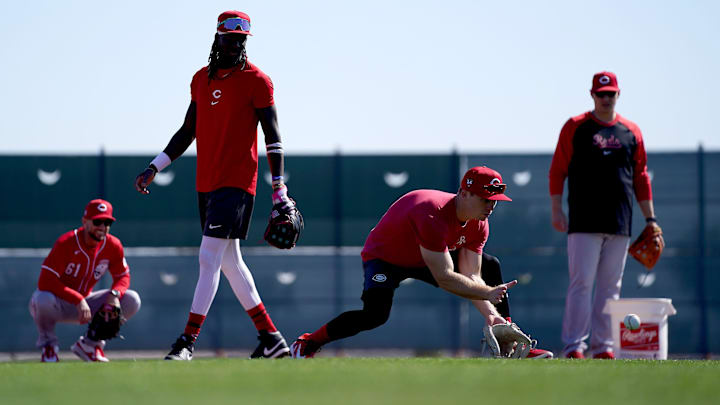 Cincinnati Reds shortstop Matt McLain (9) fields groundballs with Cincinnati Reds third baseman Elly De La Cruz (44) during spring training workouts, Wednesday, Feb. 14, 2024, at the team s spring training facility in Goodyear, Ariz. Cincinnati Reds shortstop Matt McLain (9) fields groundballs with Cincinnati Reds third baseman Elly De La Cruz (44) during spring training workouts, Wednesday, Feb. 14, 2024, at the team s spring training facility in Goodyear, Ariz.
