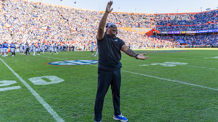 Nov 23, 2024; Gainesville, Florida, USA; Florida Gators associate head coach for running backs Jabbar Juluke celebrates after a game against the Mississippi Rebels at Ben Hill Griffin Stadium. Mandatory Credit: Matt Pendleton-Imagn Images Nov 23, 2024; Gainesville, Florida, USA; Florida Gators associate head coach for running backs Jabbar Juluke celebrates after a game against the Mississippi Rebels at Ben Hill Griffin Stadium. Mandatory Credit: Matt Pendleton-Imagn Images