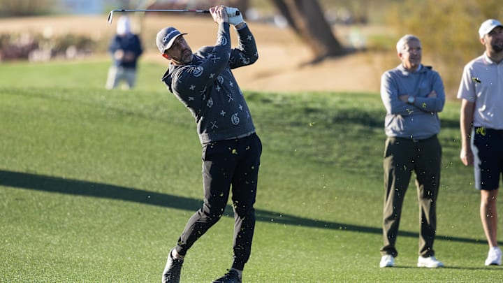 Aaron Rodgers on the golf course