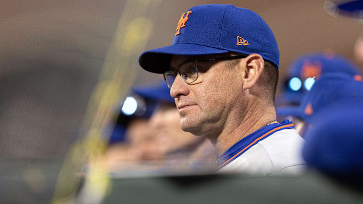 Apr 4, 2026; San Francisco, California, USA; New York Mets manager Carlos Mendoza watches his team take on the San Francisco Giants during the ninth inning at Oracle Park. Mandatory Credit: D. Ross Cameron-Imagn Images