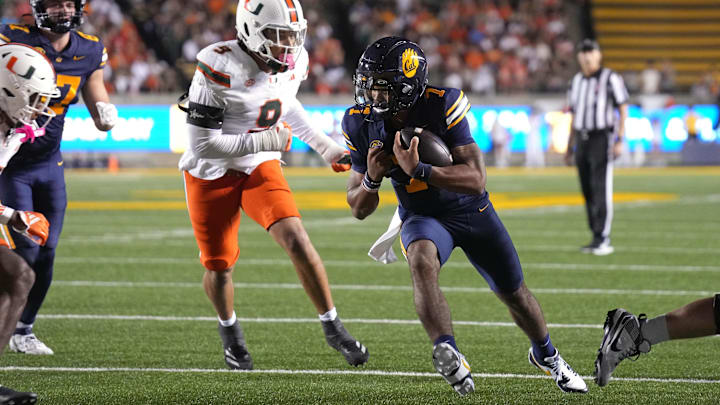 Chandler Rogers dashes into the end zone vs. Miami