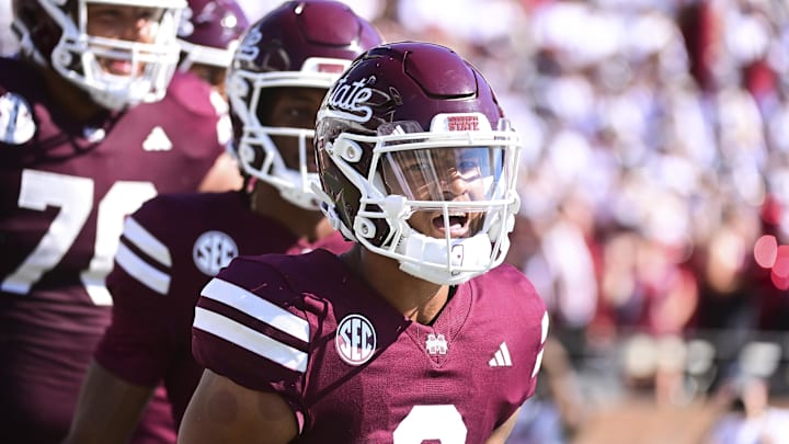 Oct 26, 2024; Starkville, Mississippi, USA; Mississippi State Bulldogs quarterback Michael Van Buren Jr. (0) reacts after a touchdown against the Arkansas Razorbacks during the third quarter at Davis Wade Stadium at Scott Field. Mandatory Credit: Matt Bush-Imagn Images