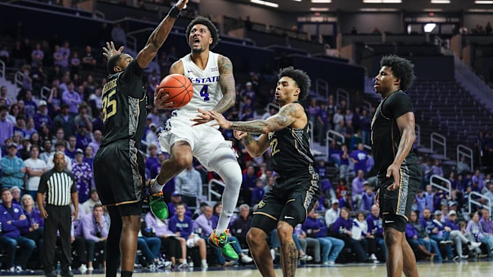 Jan 14, 2026; Manhattan, Kansas, USA; Kansas State Wildcats guard PJ Haggerty (4) shoots against the UCF Knights during the second half at Bramlage Coliseum. Mandatory Credit: Jay Biggerstaff-Imagn Images