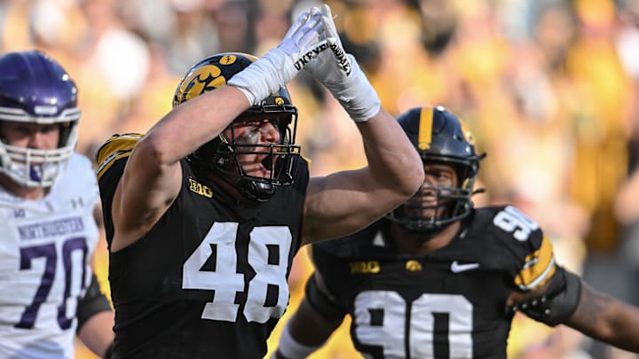 Oct 26, 2024; Iowa City, Iowa, USA; Iowa Hawkeyes defensive lineman Max Llewellyn (48) reacts after a safety against the Northwestern Wildcats during the second quarter at Kinnick Stadium. Mandatory Credit: Jeffrey Becker-Imagn Images
