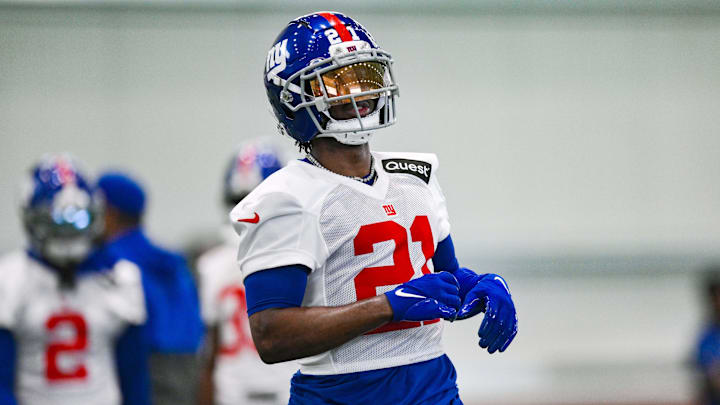 Jun 18, 2025; East Rutherford, NJ, USA; New York Giants cornerback Paulson Adebo (21) participates in a drill during minicamp at Quest Diagnostics Training Center. Jun 18, 2025; East Rutherford, NJ, USA; New York Giants cornerback Paulson Adebo (21) participates in a drill during minicamp at Quest Diagnostics Training Center.